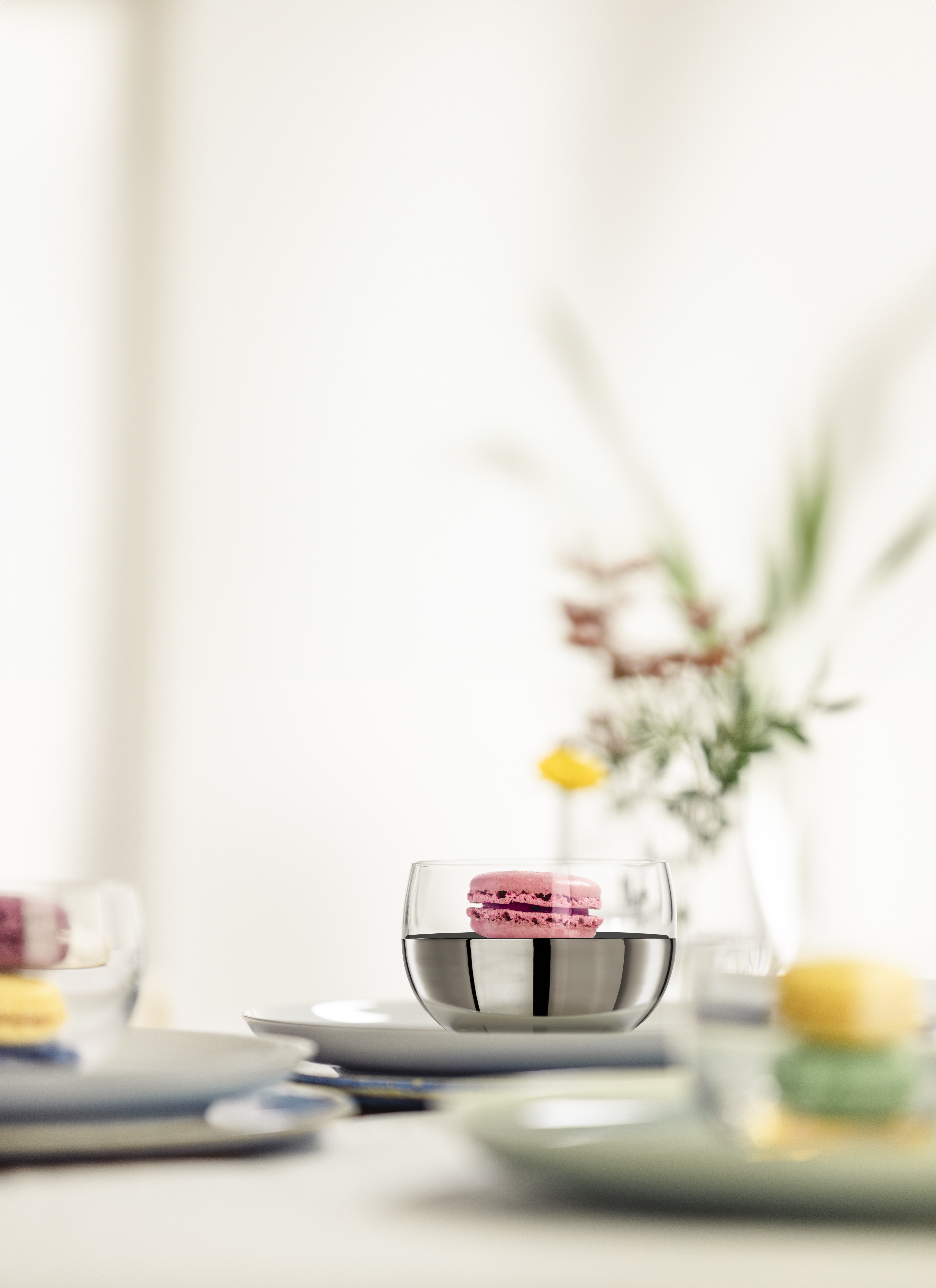 Platinum dessert bowl with pink macaron inside
