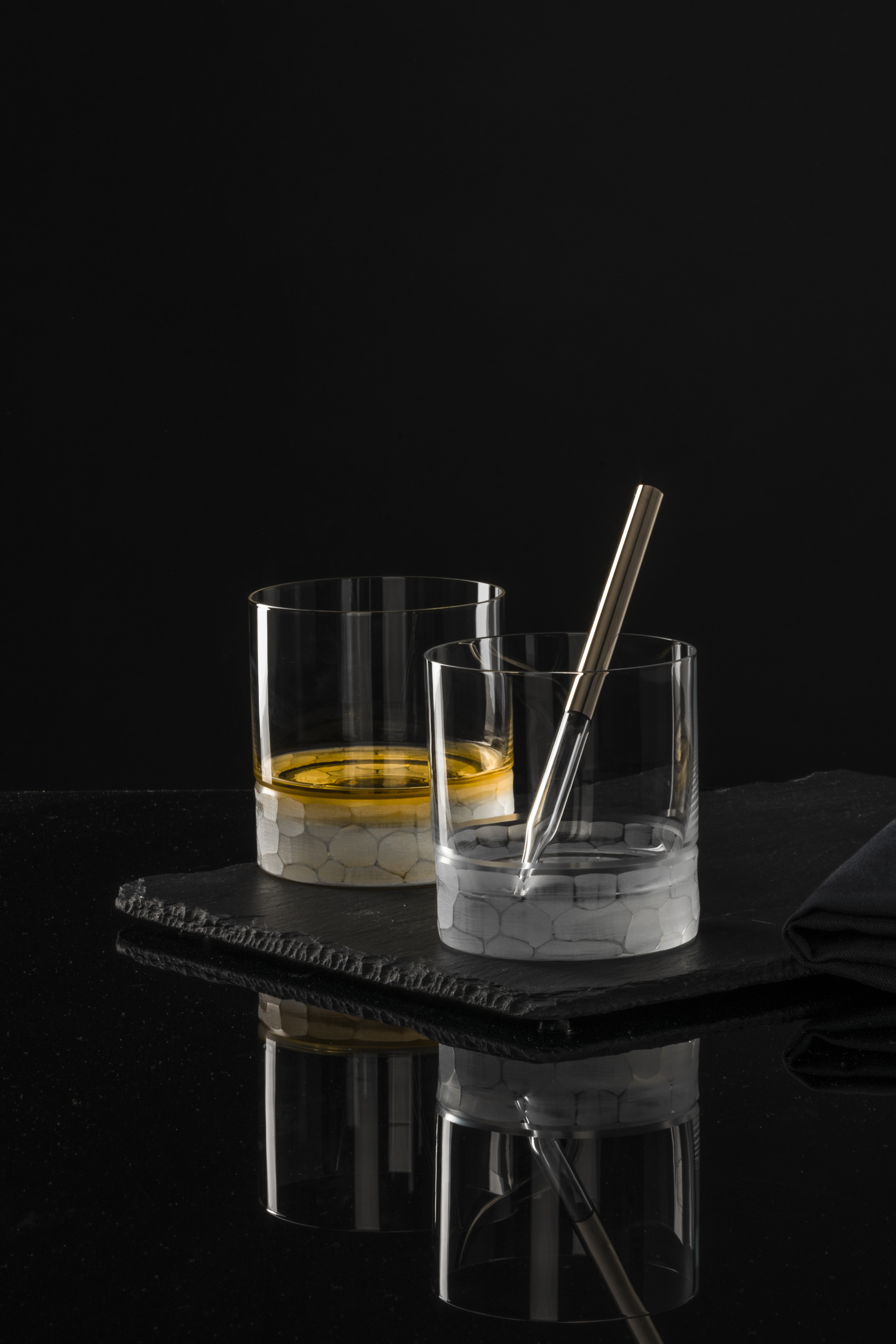 Two whisky glasses with whisky pipette
