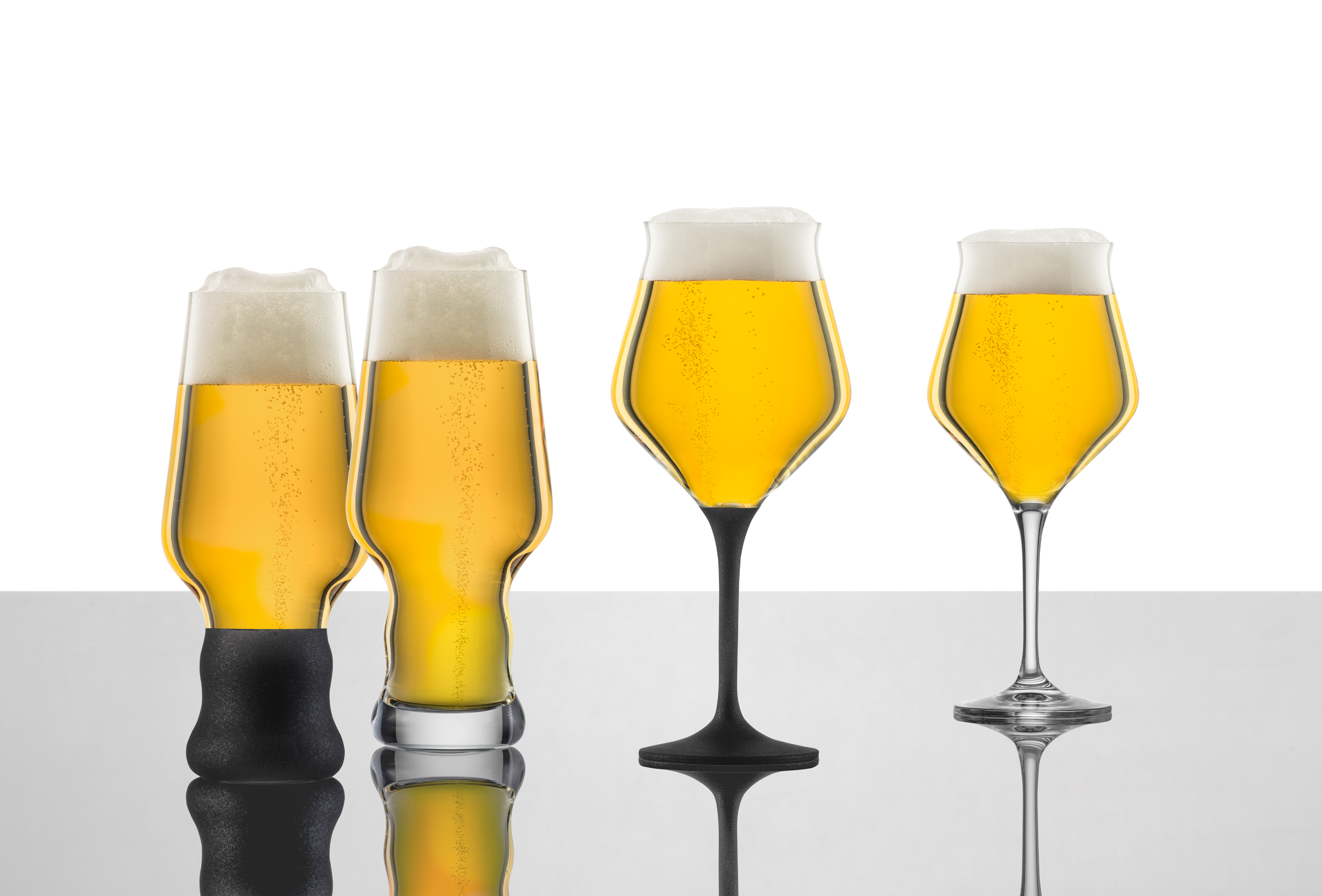 Various craft beer glasses on a table