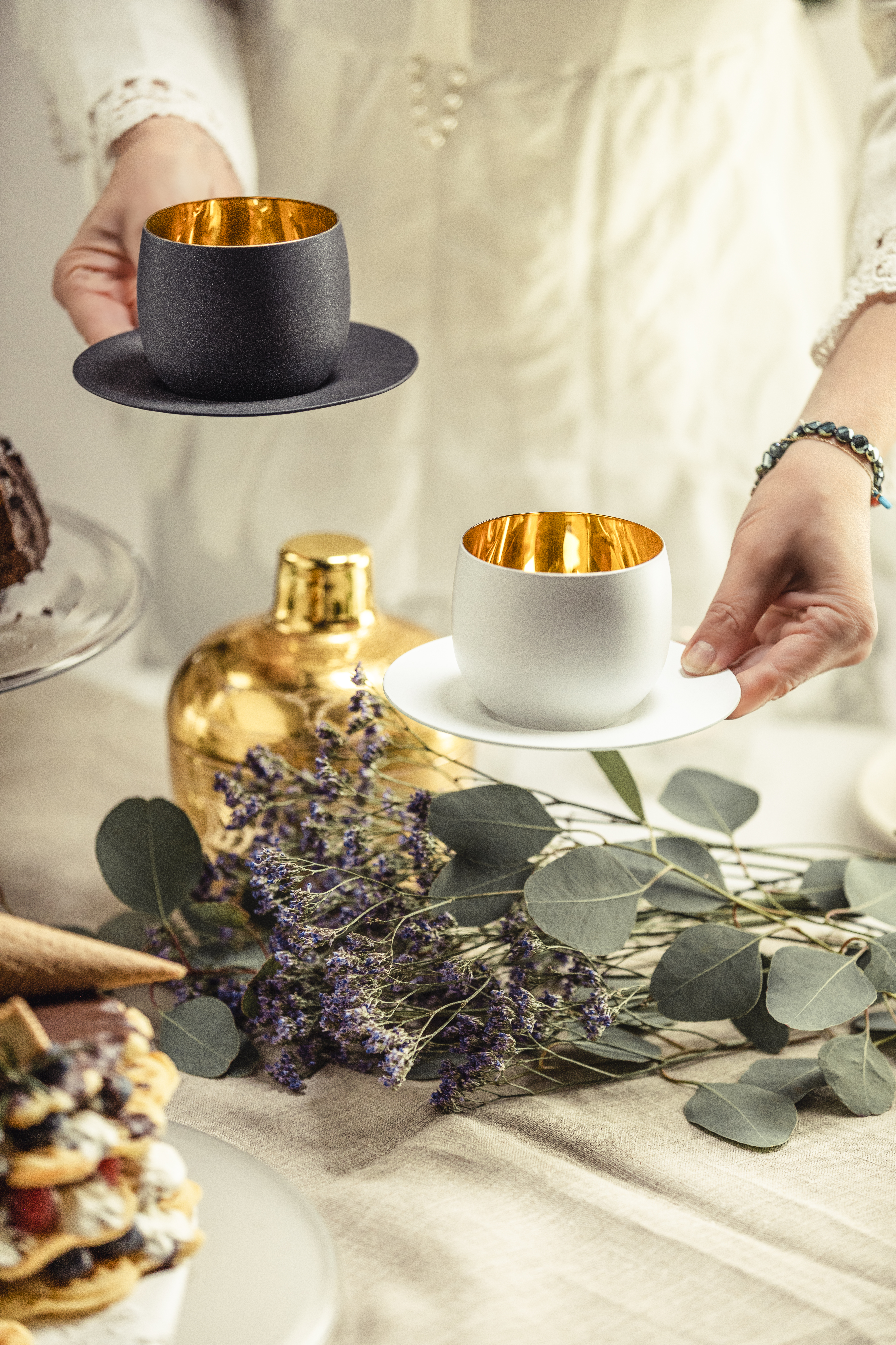 Cappuccino glasses placed on a modestly set table