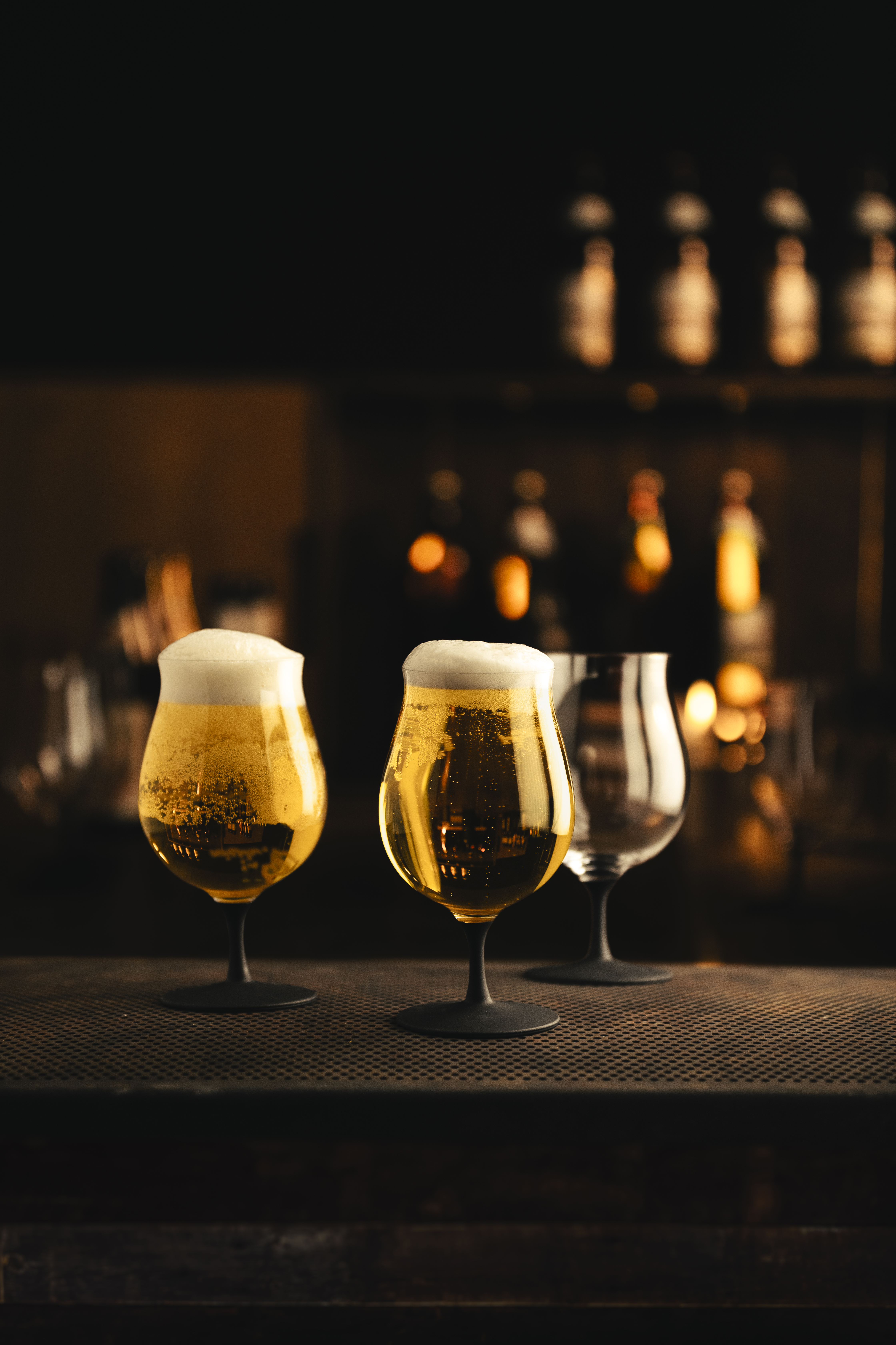 Craft beer mug with black base in a bar