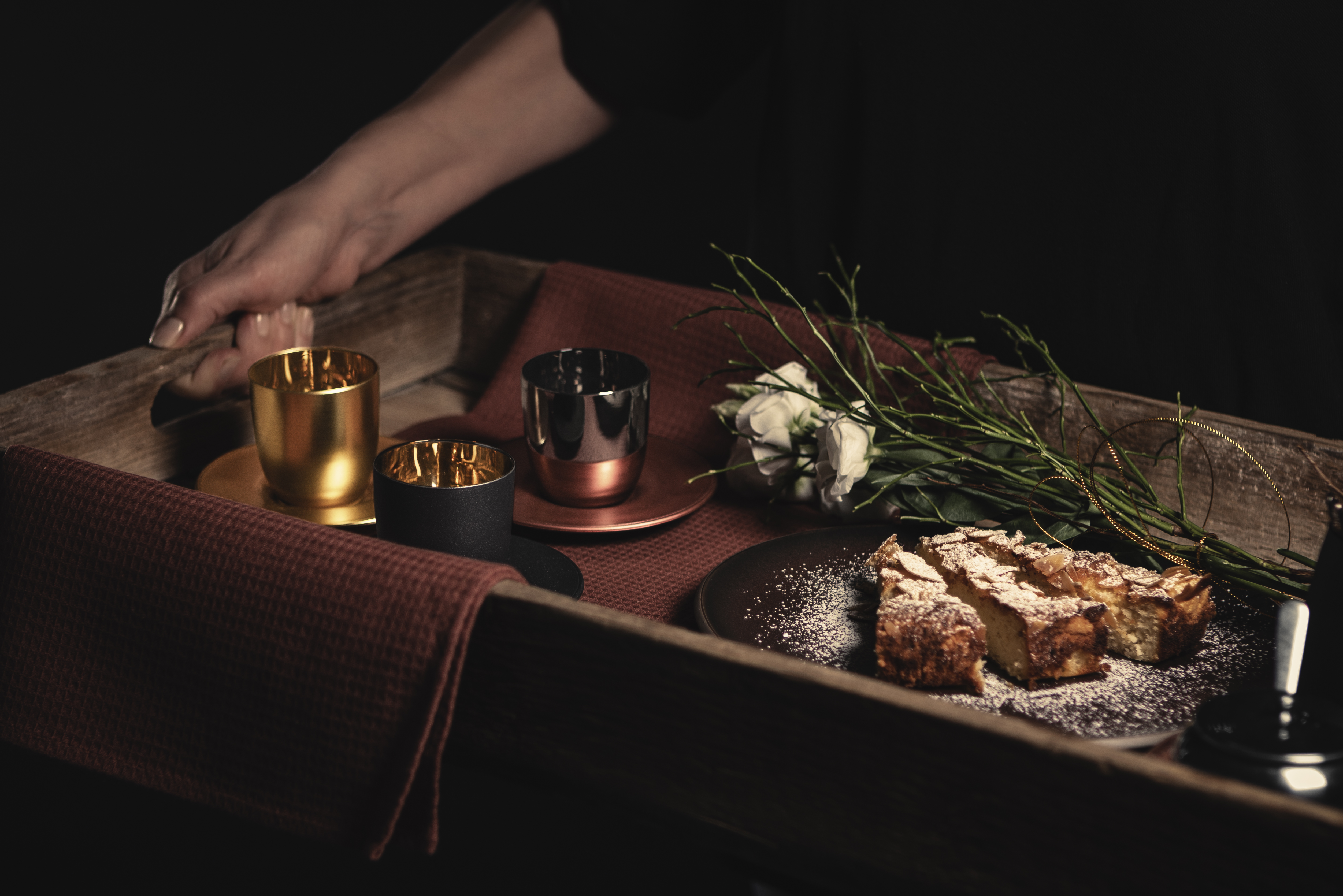 Espresso glasses on tray with cake