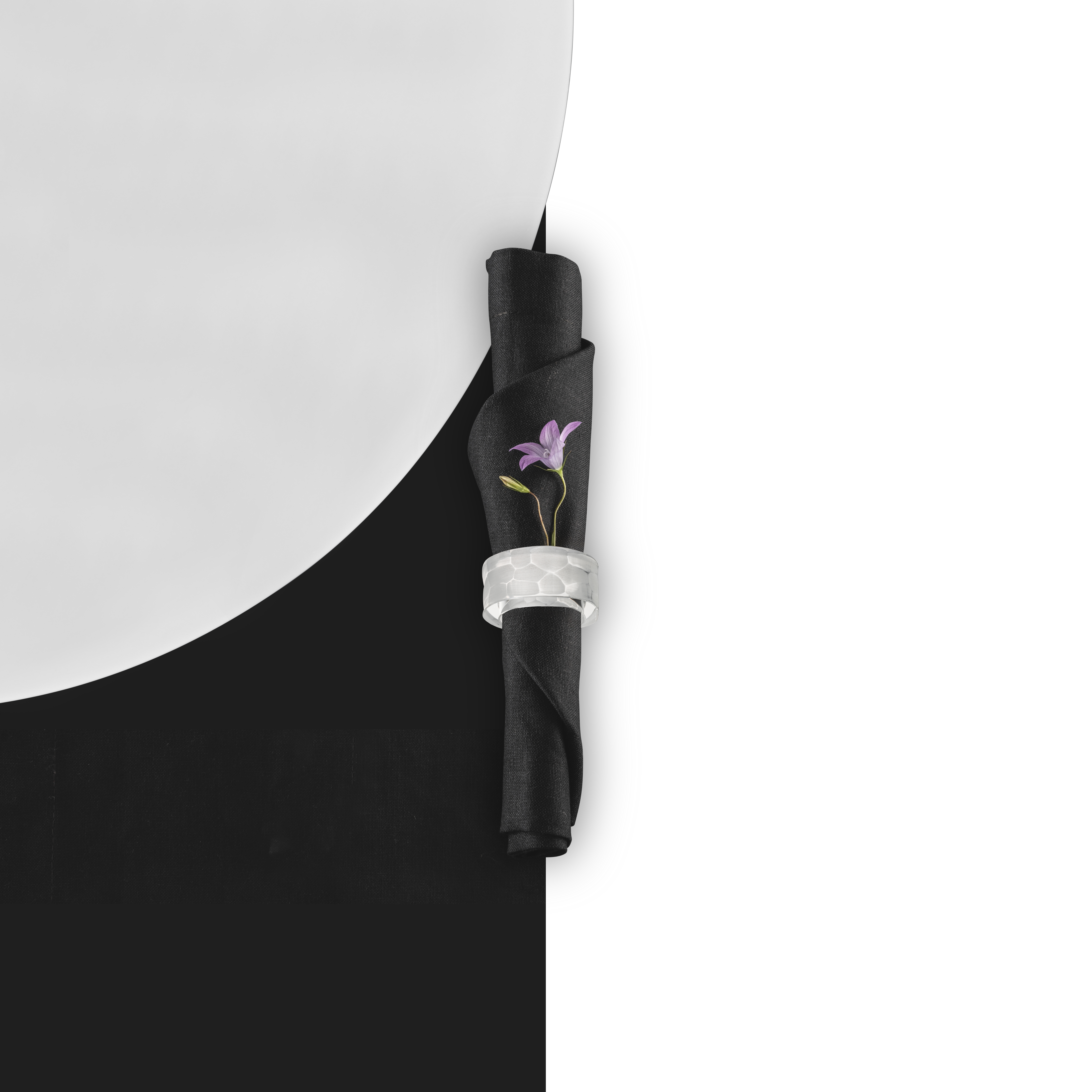 Napkin in Hamilton napkin ring with purple flower